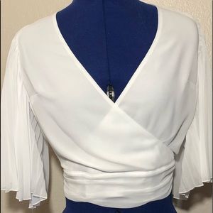 Pleated kimono sleeve wrap blouse